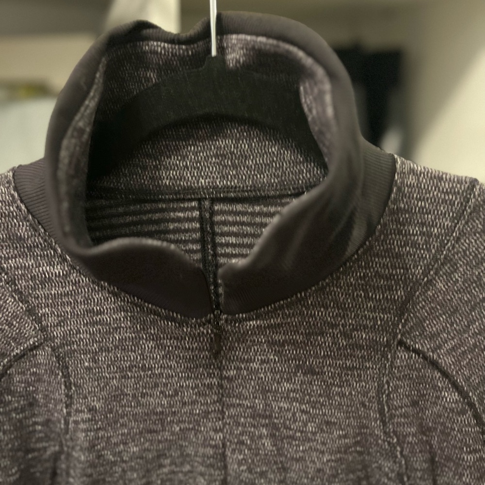 Lululemon heathered black quarter zip with black ribbed cuffs, women’s size 4
